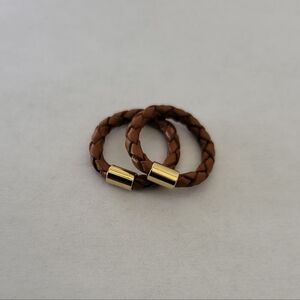 J. CREW. Two braided leather ring.